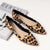 Pointed leopard flats