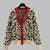 Leopard Clothing Leopard cardigan with red trim