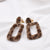 Leopard print clip on earrings