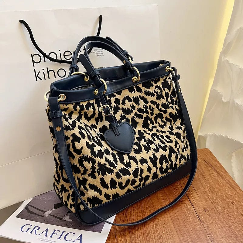 Leopard print shoulder handbags